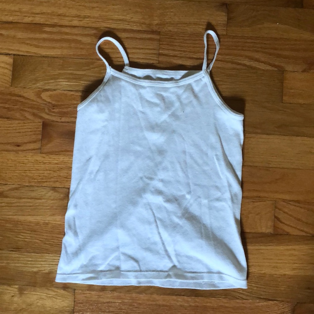 2 white tank tops